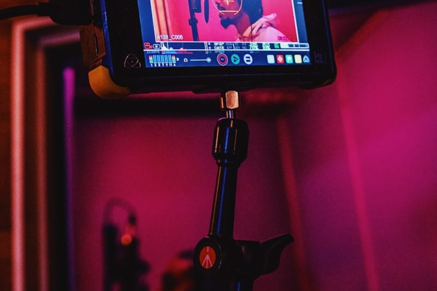 black and silver camera with tripod